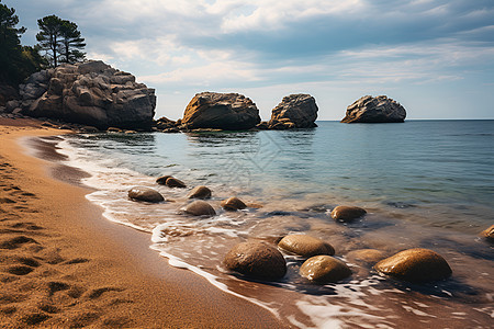 沙滩岩石间的水景图片