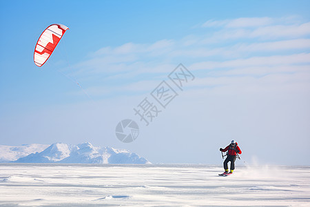 冰雪飞舞的降落伞滑雪背景图片