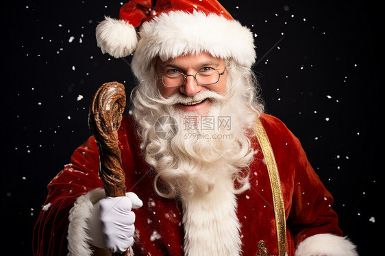 圣诞老人拿着手杖图片