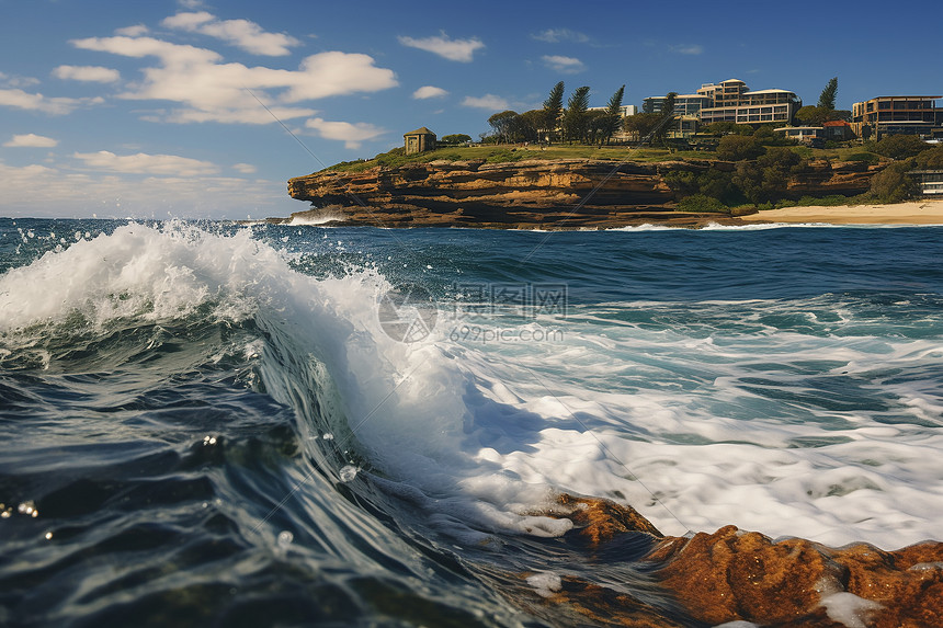 大浪拍击海边的岩石图片