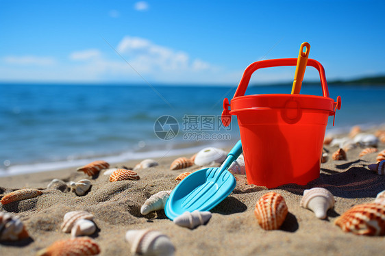 儿童乐趣的沙滩玩具桶图片