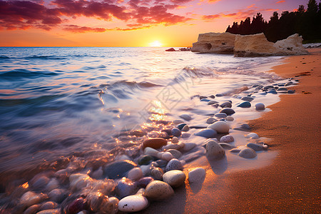 岩石海滩上的美丽日落图片