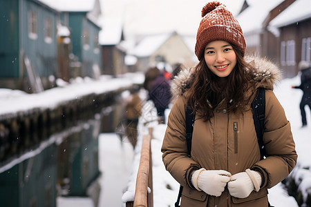 桥上建筑桥上雪景下的女子背景