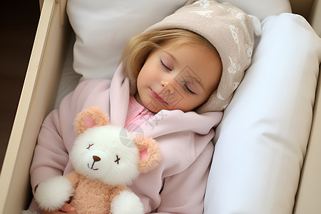 抱着小熊睡觉的女孩背景图片