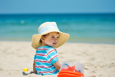 小男孩在海滩上高清图片