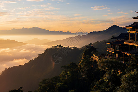 山顶建筑日落云彩高清图片