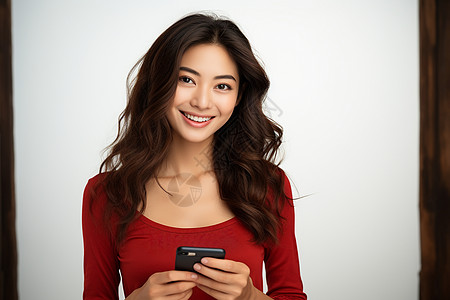 手机数据线拿着手机微笑的女子背景