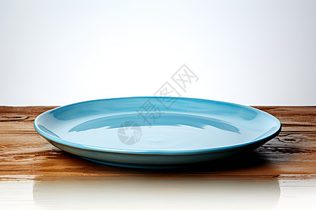 蓝色陶瓷碟子一块蓝色盘子背景