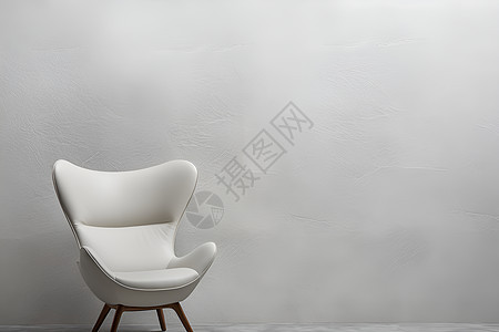 白墙下的椅子（室内家居）图片