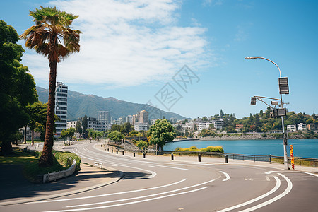 蓝天绿草海边的公路弯道背景