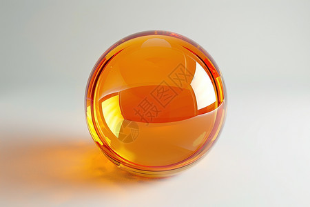 橘色光影的玻璃球图片