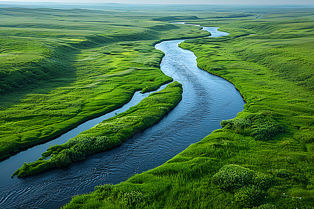草原中的美丽河流图片