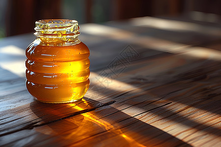 甜蜜光影阳光照耀下蜂蜜罐散发迷人光影图片