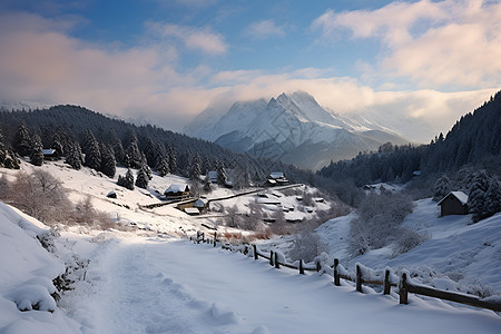 积雪山谷里的村庄图片