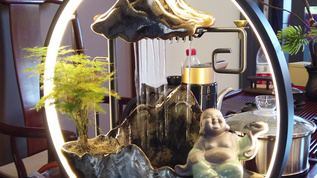 别墅客厅室内内景茶桌装饰假山视频素材