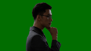4k绿幕合成抠像商务男性沉思动作旋转视频视频素材