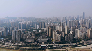 航拍摇镜头晴空下俯瞰重庆嘉陵江城市建筑群视频素材