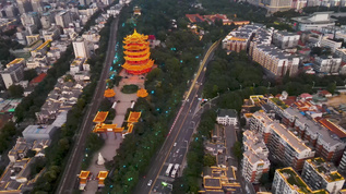 航拍华灯初上的城市夜景和黄鹤楼视频素材