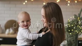 Mom and her little son had a lot of fun at home. The little boy of 2 years old is close to home and ....
