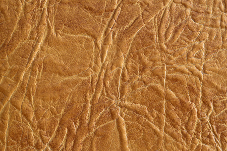 棕色皮革质地的背景。自然纹理特写。使用