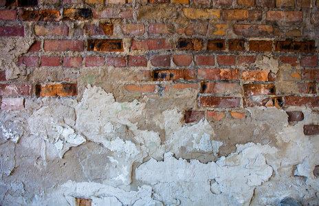 旧砖墙与损坏的石膏图片