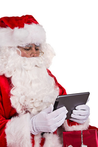 圣诞老人与平板电脑的照片