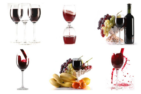 白色背景下的葡萄酒和水果