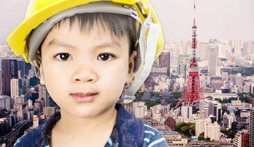 东京城市背景为未来的教育理念与工程男孩