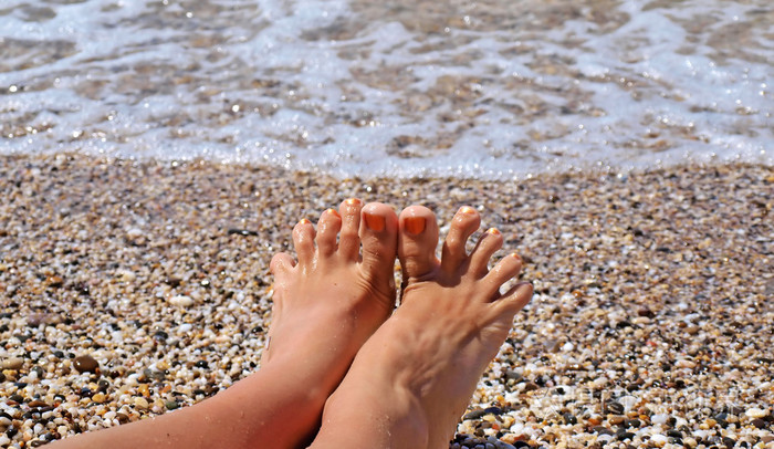Toes on the coastline