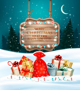 圣诞假期背景与五颜六色的礼品盒和木