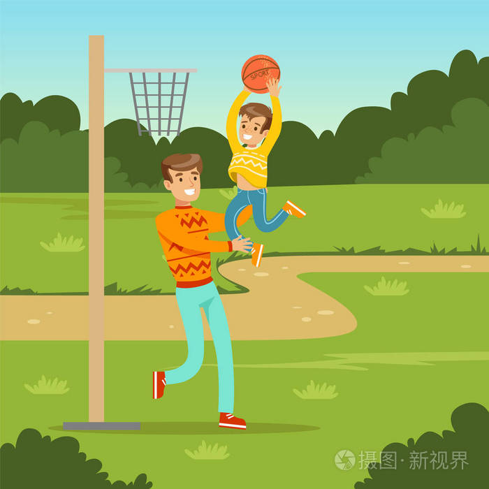 父亲和儿子在城市公园打篮球