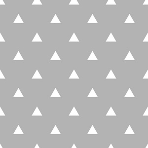 平铺矢量模式与灰色的背景上的白色三角形