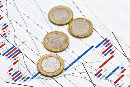 商业图形背景下的欧元硬币