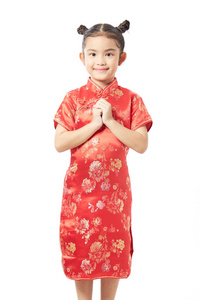 可爱的中国女孩礼服欢迎农历新年