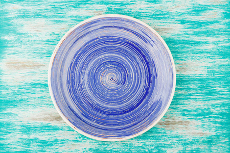 蓝色木背景蓝色陶瓷板