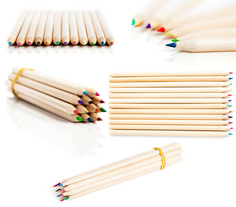 许多彩色铅笔排在白色背景上