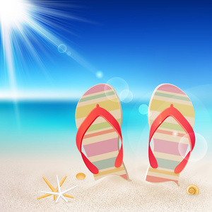 沙滩上的拖鞋和贝壳