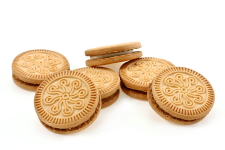 英饼干 biscuit的名词复数  美软烤饼 松饼食用时常佐以肉汁 淡黄褐色