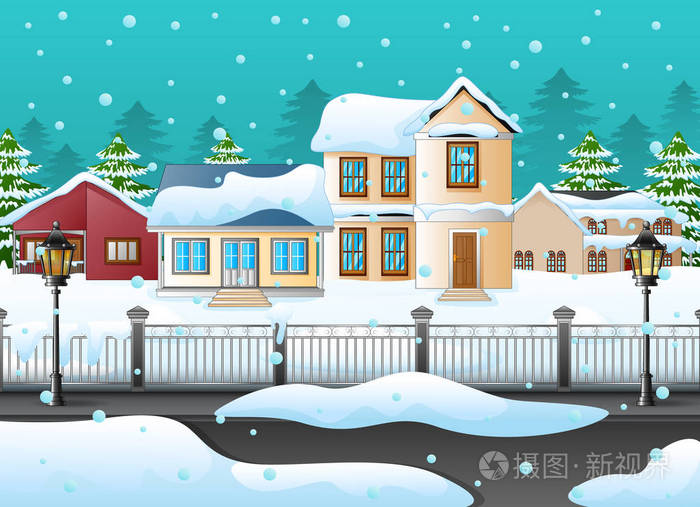 冬季景观与房子和下雪的街道