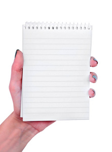 手拿着空白的笔记本在白色背景