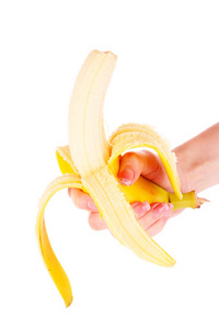 手中的一束香蕉被隔离在白色上