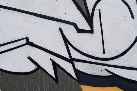 一幅抽象的涂鸦图案的混凝土墙的背景图像。街头艺术破坏和青年嗜好