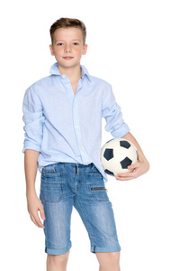 男孩少年用橄榄球
