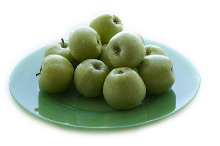 绿色的苹果, 绿色的盘子, 白色的隔离