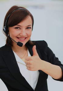 快乐微笑开朗的肖像支持电话运营商在耳机在办公室