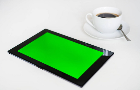 黑色平板电脑与绿色屏幕。色度键