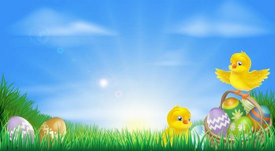 黄色复活节小鸡和鸡蛋背景