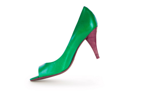 绿色的女性鞋在时尚概念