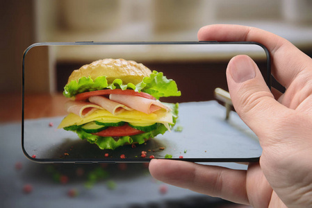 汉堡配奶酪和火腿智能手机照片