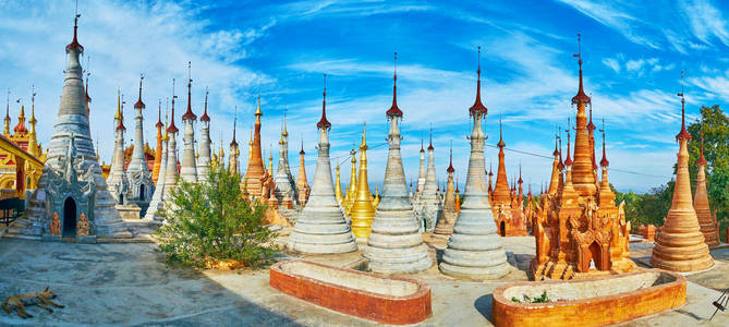 Nyaung Ohak 考古遗址和佛教建筑群的丘陵地带覆盖着数以百计的古佛塔, 装饰着错综复杂的图案和 hti 的雨伞, 在缅甸